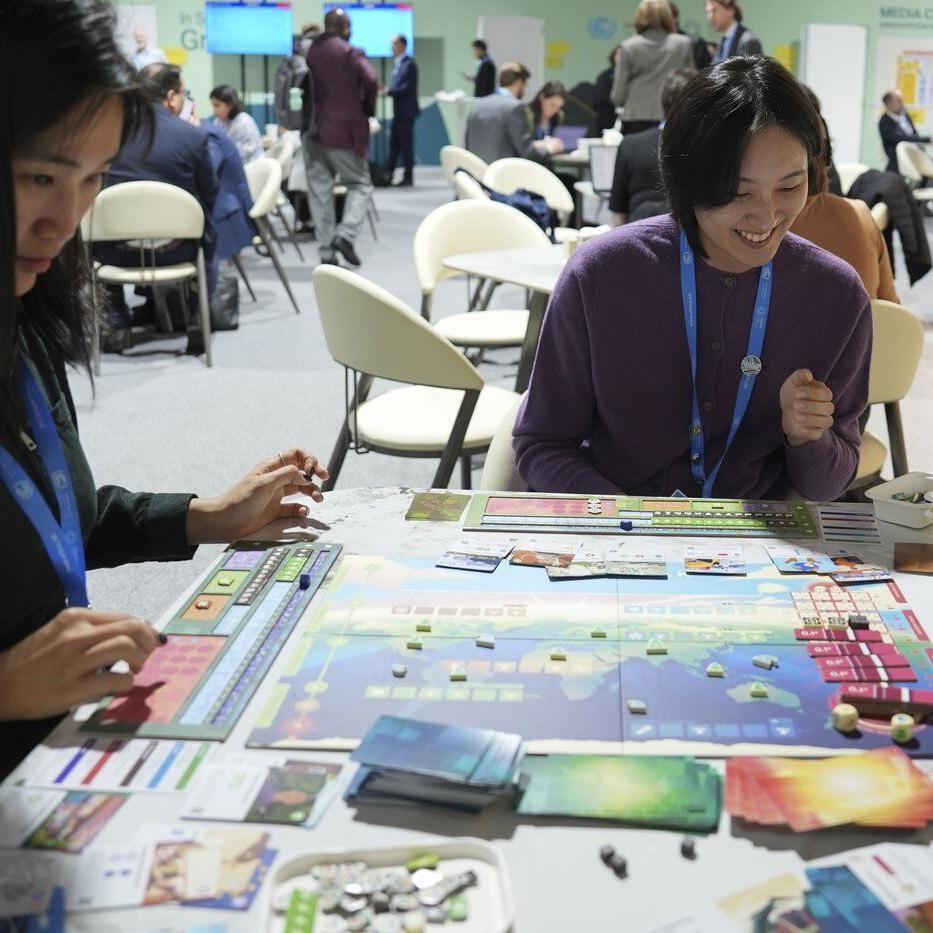 In a board game, climate experts work to save the world, which diplomats at COP29 try in real life